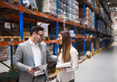 warehouse-managers-visiting-large-warehouse-checking-distribution
