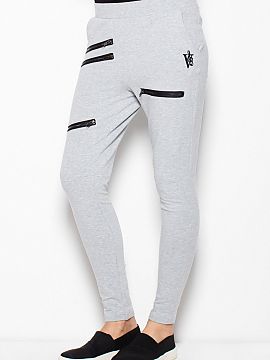 Tracksuit trousers   Venaton  Tapered sweatpants with a low crotch and pockets. Decorative zippers on each leg. Trousers are a base for many stylings.